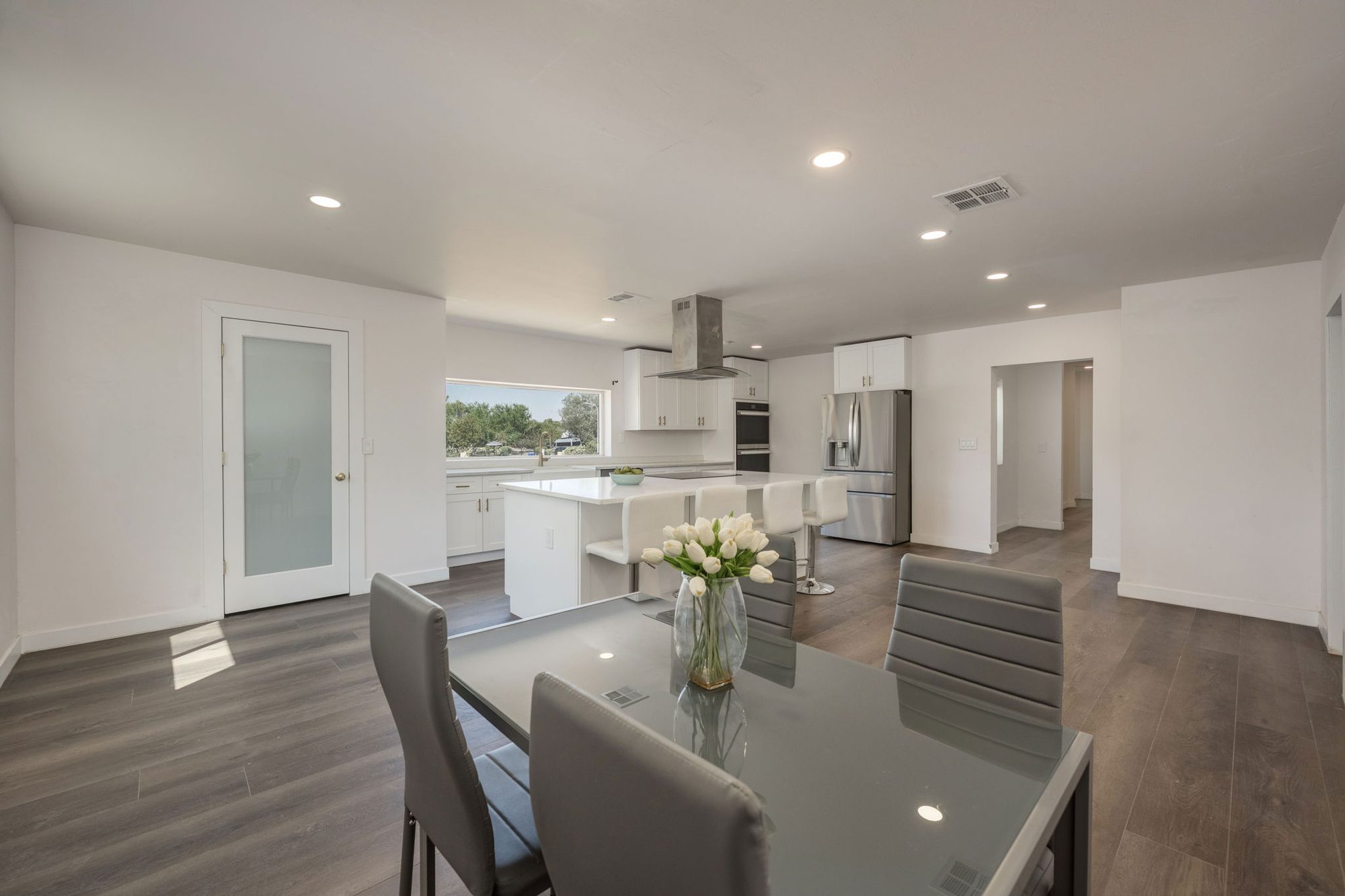 Dining area open to the kitchen and island