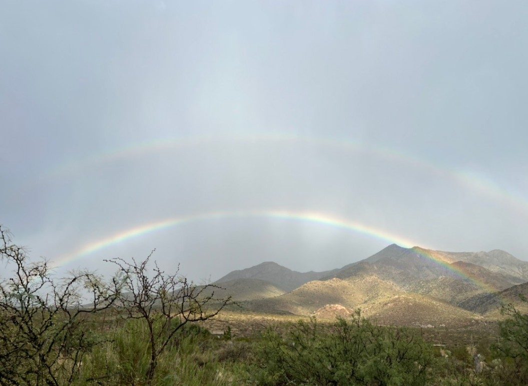 Rainbow arcing over the Organ Mountains