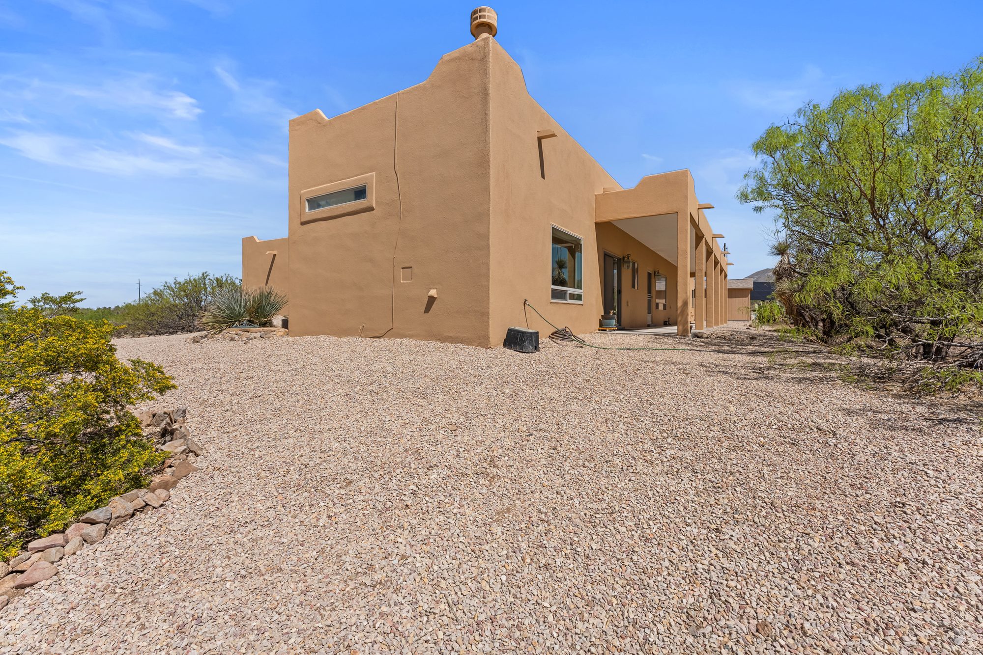 Adobe exterior and desert landscape