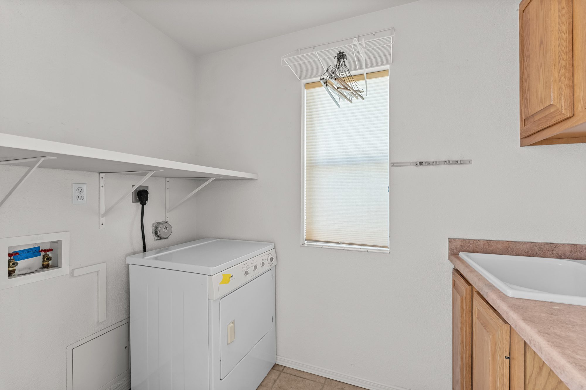 Laundry room with utility sink