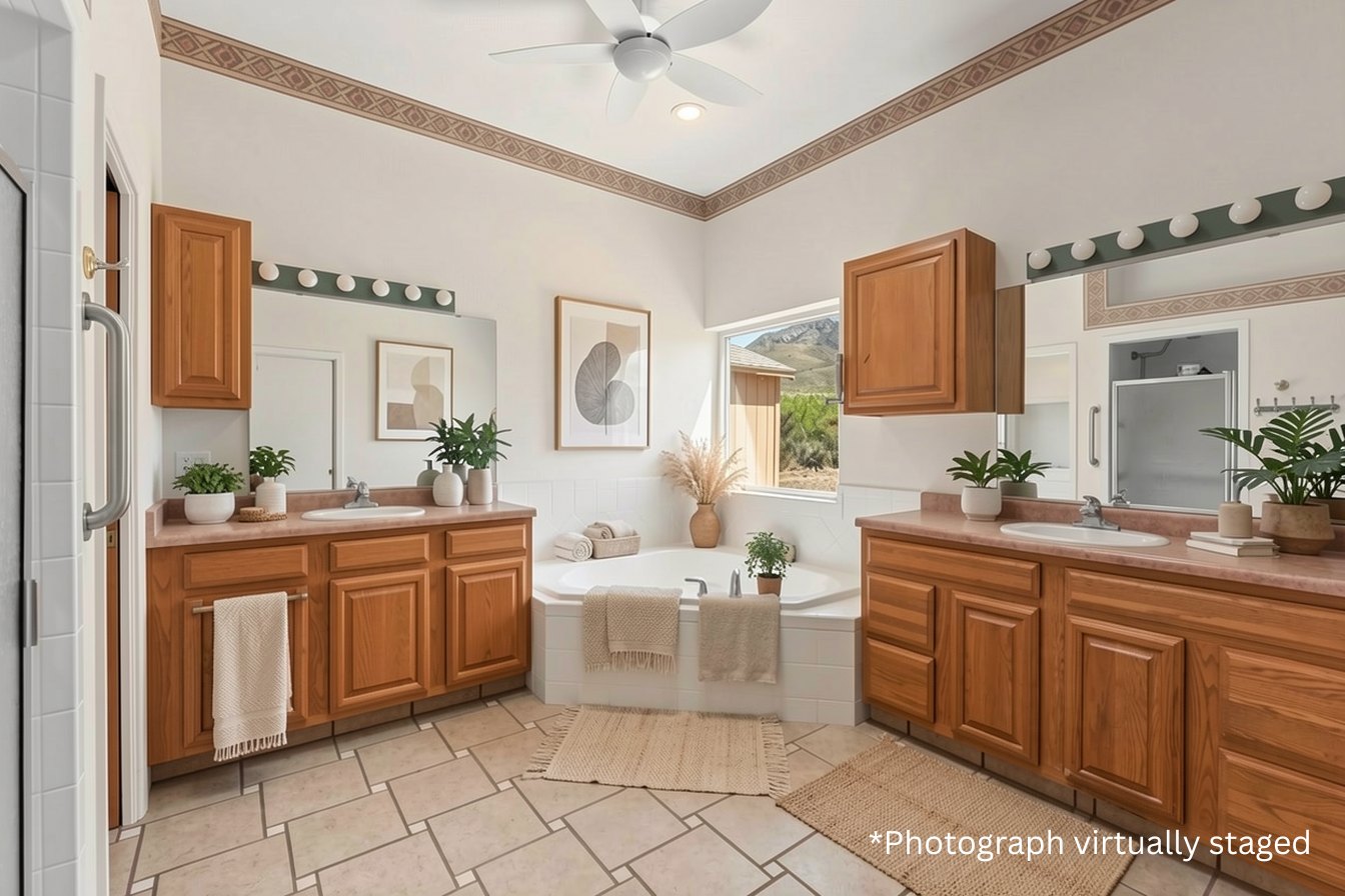 Southwest kitchen with oak cabinetry and tile counters, virtually staged