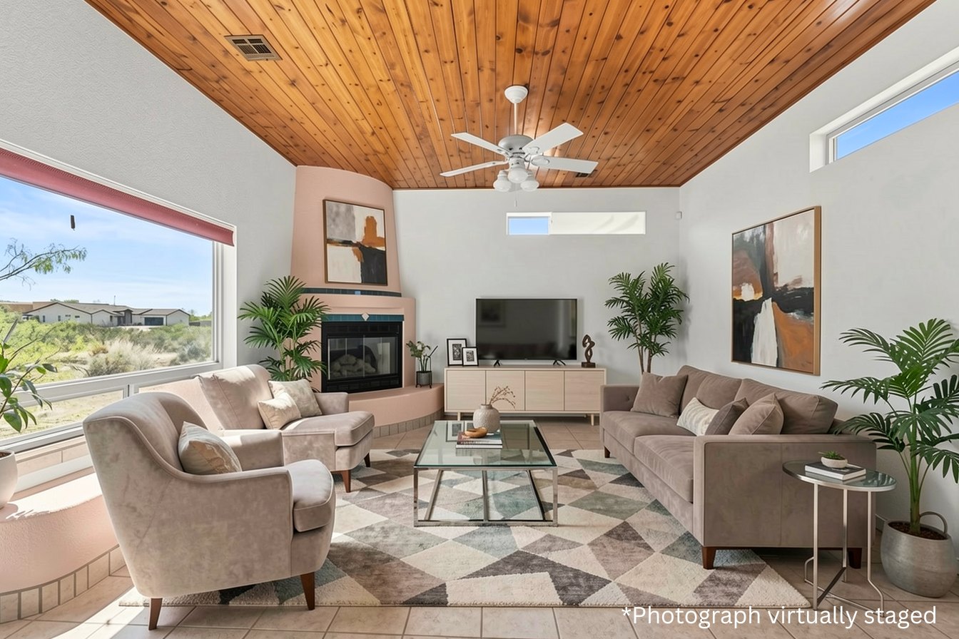 Living room with kiva fireplace, virtually staged